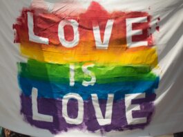 white and multicolored love is love banner 1280638 scaled