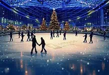 Palazzo Lombardia si trasforma in una grande distesa ghiacciata per Natale Palazzo Lombardia si trasforma in una grande distesa ghiacciata per Natale